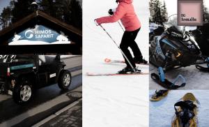 a person on skis and a person on a snowmobile at Ameno 1 Himos by DG Lomailu in Jämsä