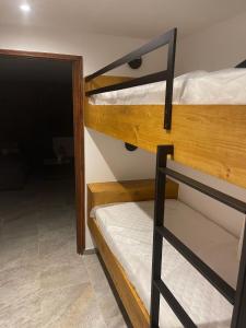 Postel nebo postele na pokoji v ubytování Chalet de la buche croisée