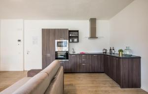 Η κουζίνα ή μικρή κουζίνα στο Cozy Apartment In Siena With Sauna