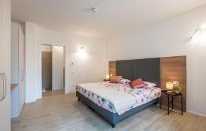 Ένα ή περισσότερα κρεβάτια σε δωμάτιο στο Pet Friendly Apartment In Siena