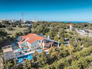 an aerial view of a house with a swimming pool at Artzy Villa in Rhodes Town