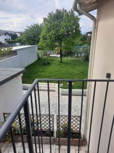 a balcony with a view of a park at Piccola Corte in Udine
