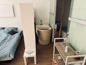 Ένα ή περισσότερα κρεβάτια σε δωμάτιο στο Appartement NITI