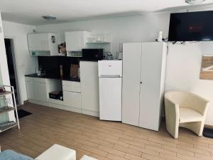 Η κουζίνα ή μικρή κουζίνα στο Appartement NITI