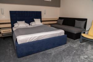 Postel nebo postele na pokoji v ubytování Complex Turistic Monaco
