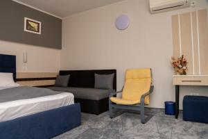 Postel nebo postele na pokoji v ubytování Complex Turistic Monaco