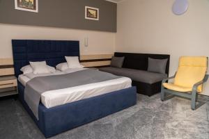 Postel nebo postele na pokoji v ubytování Complex Turistic Monaco