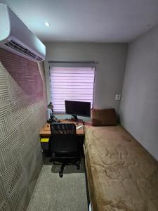 Rúm í herbergi á Casa inteira l 7 min Alphaville