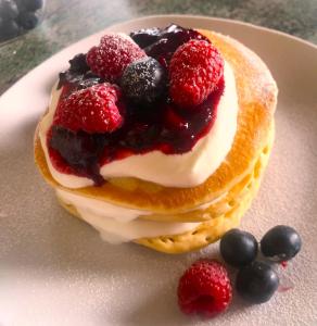 a pancake with fruit on it on a plate at Bransford Farm Fishery & B & B in Bransford +56 photos