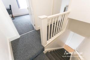 a view of a stairwell in a house at Irvine Contractor Accommodation in Leigh