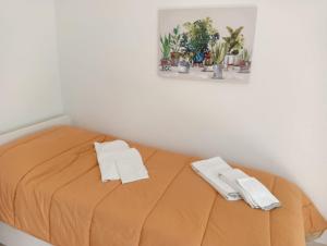 Posteľ alebo postele v izbe v ubytovaní La villetta di zio Claudio a Vada - 6 posti letto