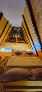 Postel nebo postele na pokoji v ubytování Biserni Kutak