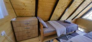 Postel nebo postele na pokoji v ubytování Biserni Kutak