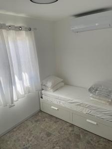 Postelja oz. postelje v sobi nastanitve צימר נסה (הכלה)
