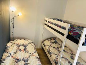 Postel nebo postele na pokoji v ubytování Happy Day-Appartement entier 2 chambres-60 m2