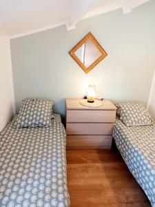 Ένα ή περισσότερα κρεβάτια σε δωμάτιο στο Casa Littoral