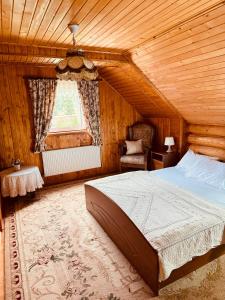 Postel nebo postele na pokoji v ubytování Cottage Kalinka