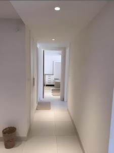 A bed or beds in a room at Marassi north coast