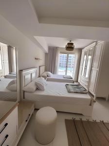 A bed or beds in a room at Marassi north coast