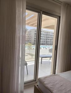 A bed or beds in a room at Marassi north coast
