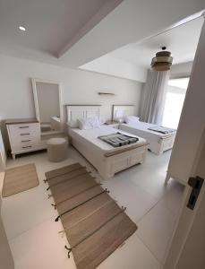 A bed or beds in a room at Marassi north coast Még 3 kép
