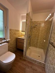 Koupelna v ubytování Ferienhaus Frau Möller + 15 fotografií