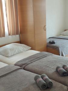 Postel nebo postele na pokoji v ubytování Royal Apartments