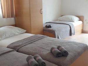 Postel nebo postele na pokoji v ubytování Royal Apartments
