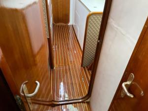 an empty stairs in a train with a mirror at Gestione Mare Diving & Charter in Siracusa