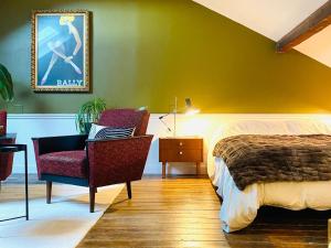 Ένα ή περισσότερα κρεβάτια σε δωμάτιο στο La chambre 1911