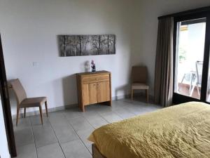 Postel nebo postele na pokoji v ubytování Residenza Viramonte - Casa Daniela, Wohnung 34