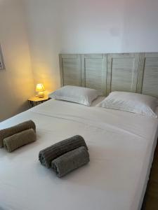 Letto o letti in una camera di Sur La Mer - Appartement Deux chambres à Schoelcher
