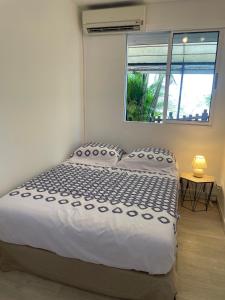 Letto o letti in una camera di Sur La Mer - Appartement Deux chambres à Schoelcher