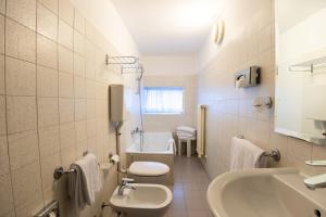 Ванная комната в Hotel Como