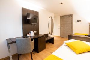 Кровать или кровати в номере Hotel Como