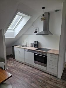 Kuchyň nebo kuchyňský kout v ubytování Ferienwohnung in der Heide