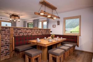 Posedenie v ubytovaní Alpen Chalet Wohnung "Martha"