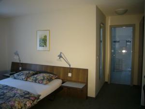Postel nebo postele na pokoji v ubytování Hotel Linde