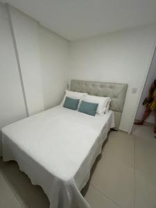 En eller flere senger på et rom på A pérola de Costa Azul