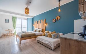Posezení v ubytování New Gudauri Loft 2 Pines