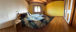 Ένα ή περισσότερα κρεβάτια σε δωμάτιο στο Gîte Les sources proche Annecy