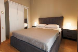 Postel nebo postele na pokoji v ubytování Harmony House