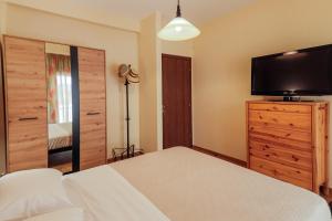 Postel nebo postele na pokoji v ubytování Harmony House