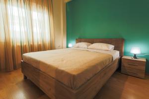 Postel nebo postele na pokoji v ubytování Harmony House