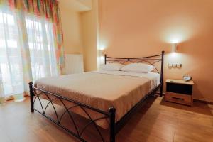 Postel nebo postele na pokoji v ubytování Harmony House