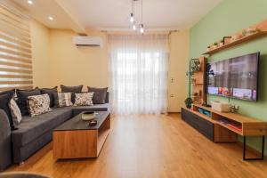 TV a/nebo společenská místnost v ubytování Harmony House