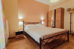 Postel nebo postele na pokoji v ubytování Harmony House