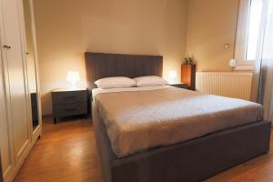 Postel nebo postele na pokoji v ubytování Harmony House