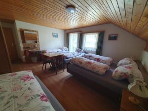 Postel nebo postele na pokoji v ubytování Plaun Grond