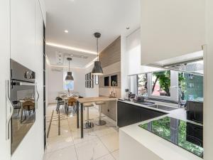 Η κουζίνα ή μικρή κουζίνα στο Enjoy B-52 Crown